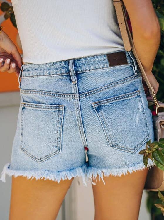 High-Rise Ripped Denim Fringe Shorts